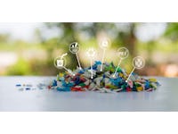 Plastic bottle crushed or Small pieces of cut colorful plastic bottles with Blurred green background. Recycle icon, sustainable icon and Bottle icon. Chemical concept